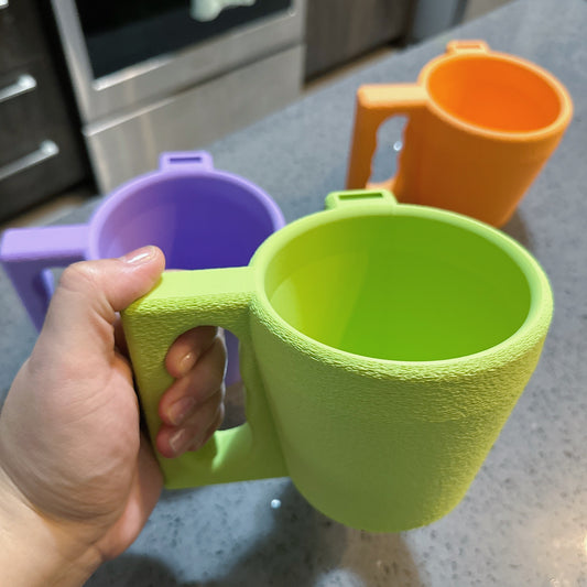 Three ice cream pint holders in mint green, orange and lilac