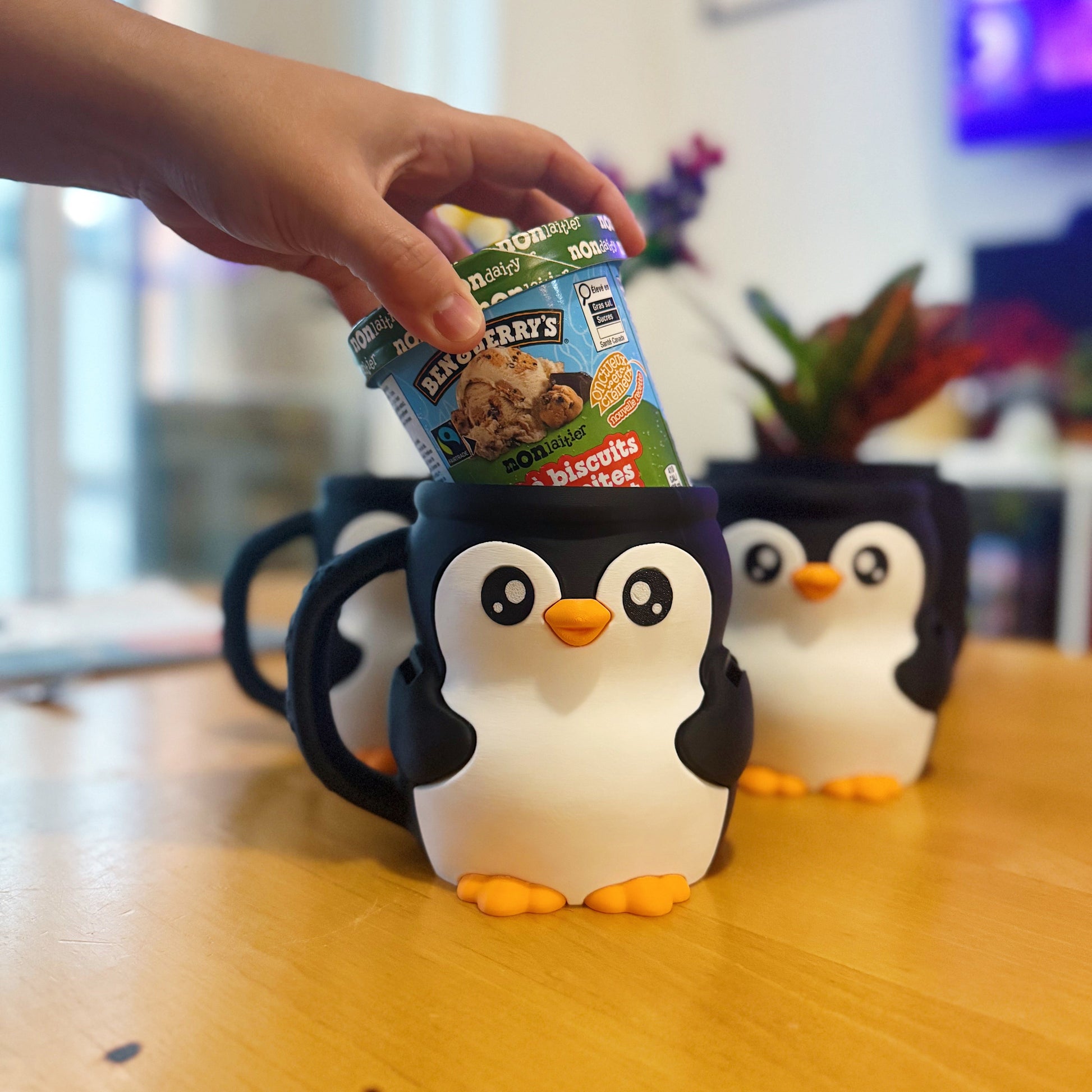 Penguin ice cream tub holder with side handle and insert for two spoons